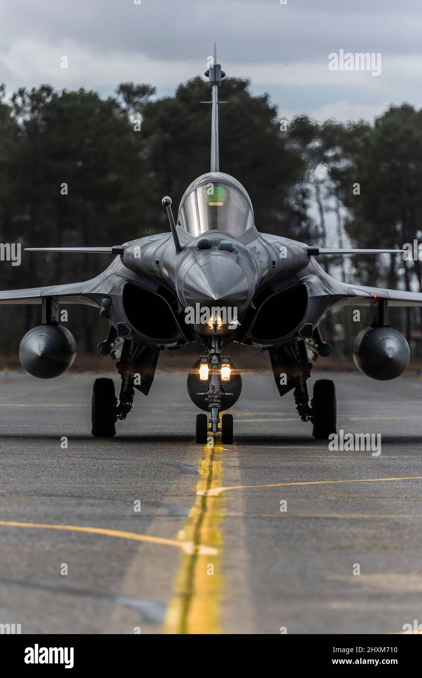 A French Rafale fighter jet taxis for takeoff at Mont-de-Marsan Air Base as it prepares to launch on a Combat Air Patrol (CAP) mission over Poland. On February 24, the French Air Force began flying sorties over Poland, contributing to the security of the skies over the eastern part of the Alliance.  (Photo: NATO) Stock Photo