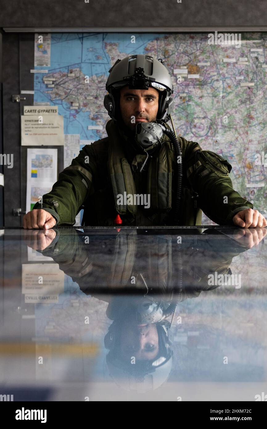 A French fighter suits up at Mont-de-Marsan Air Base as he prepares to launch on a Combat Air Patrol (CAP) mission over Poland. On February 24, the French Air Force began flying sorties over Poland, contributing to the security of the skies over the eastern part of the Alliance.  (Photo: NATO) Stock Photo