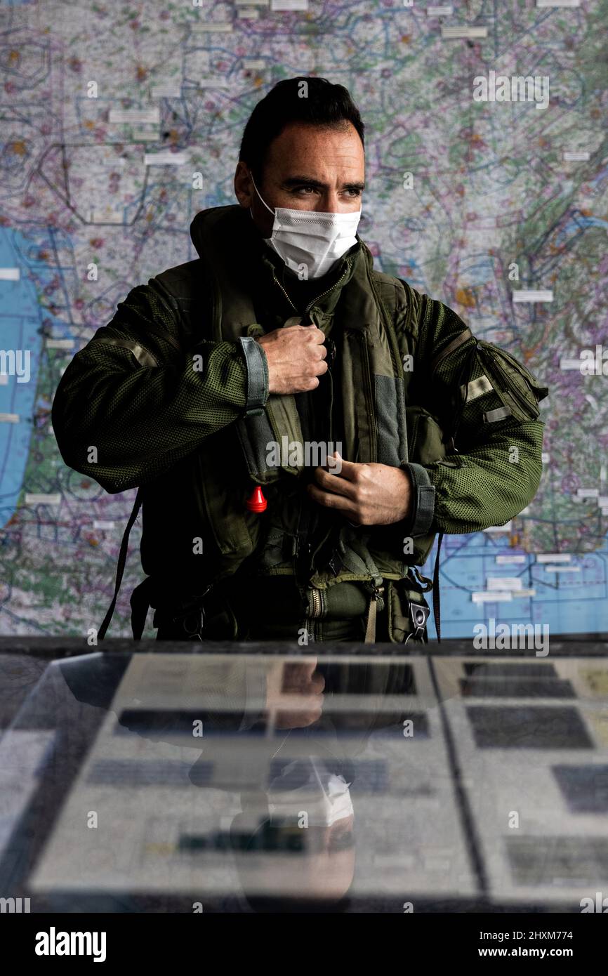 A French fighter suits up at Mont-de-Marsan Air Base as he prepares to launch on a Combat Air Patrol (CAP) mission over Poland. On February 24, the French Air Force began flying sorties over Poland, contributing to the security of the skies over the eastern part of the Alliance.  (Photo: NATO) Stock Photo