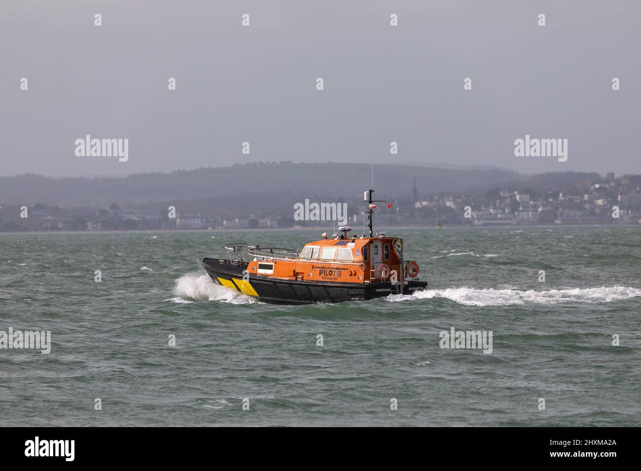 Harbour pilot boat at speed crossing the Solent near Portsmouth Stock Photo