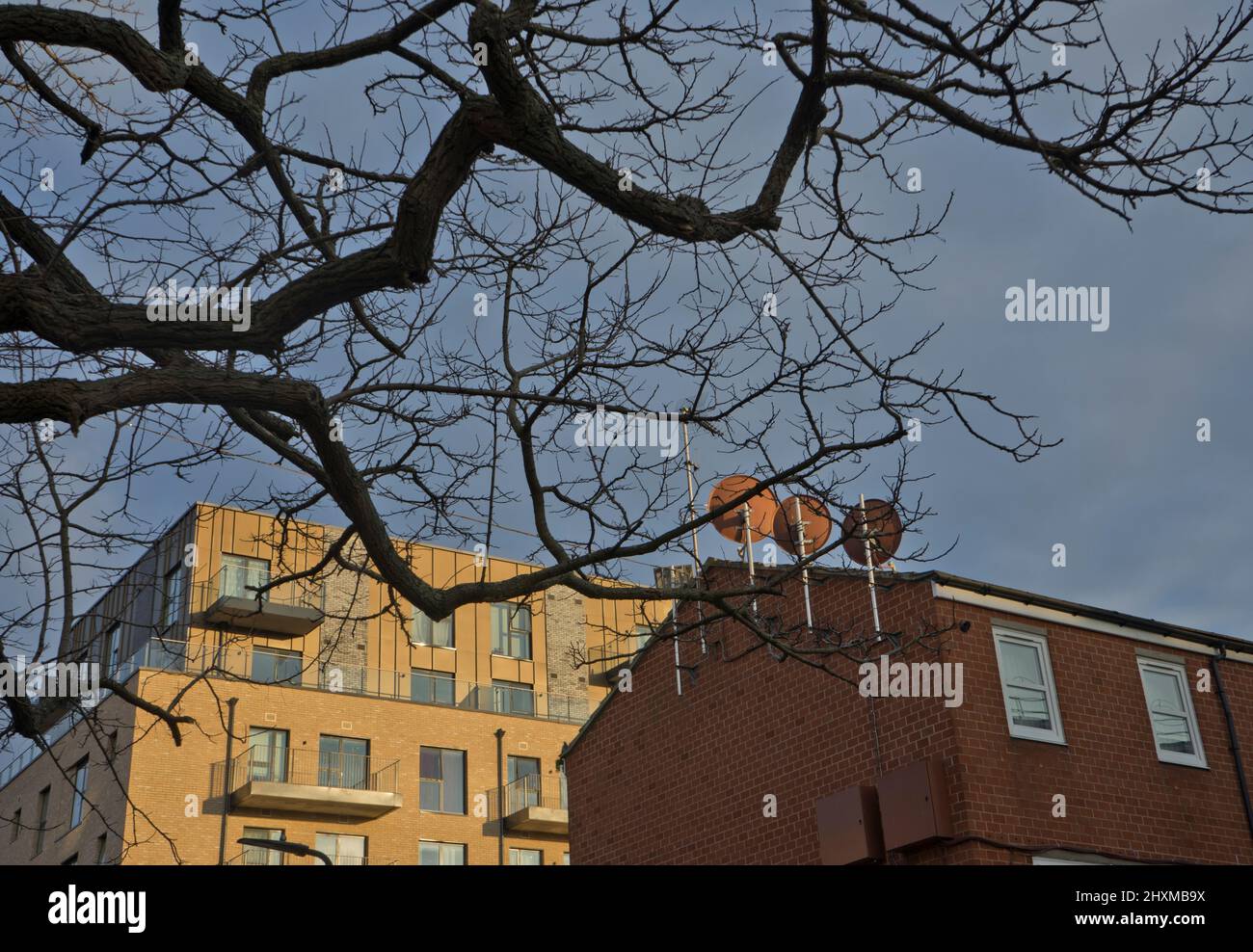 New luxury housing development next to rundown social housing estate