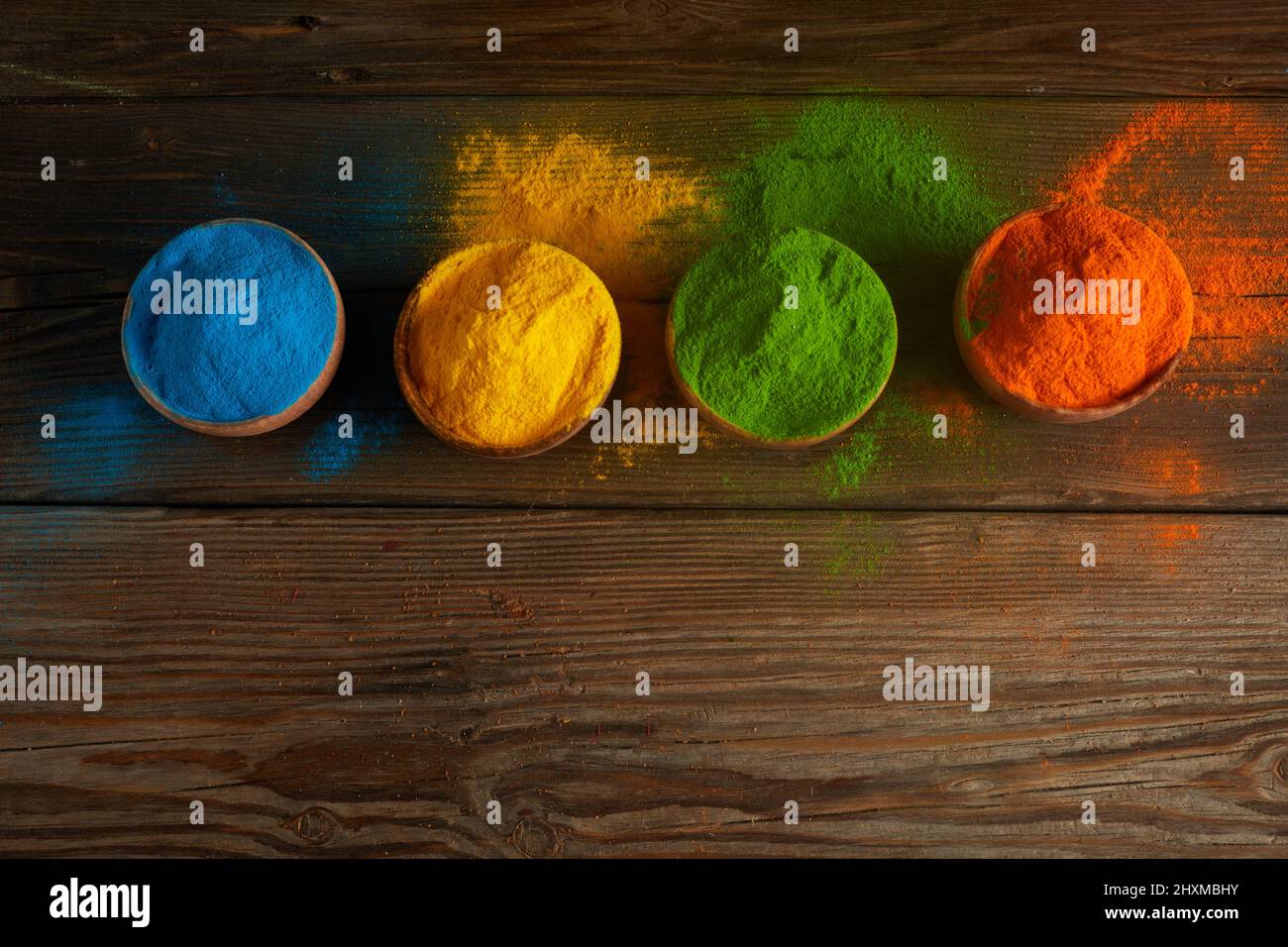 Colorful holi powder. In bowls on brown wooden table , #sponsored, #powder,  #holi, #Colorful, #bowls, #table #ad