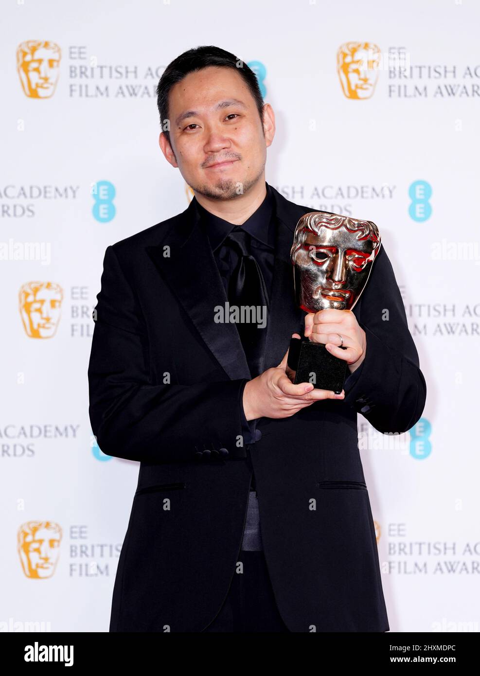 Ryusuke Hamaguchi in the press room after winning the Film Not In The English Language award for Drive My Car at the 75th British Academy Film Awards held at the Royal Albert Hall in London. Picture date: Sunday March 13, 2022. Stock Photo