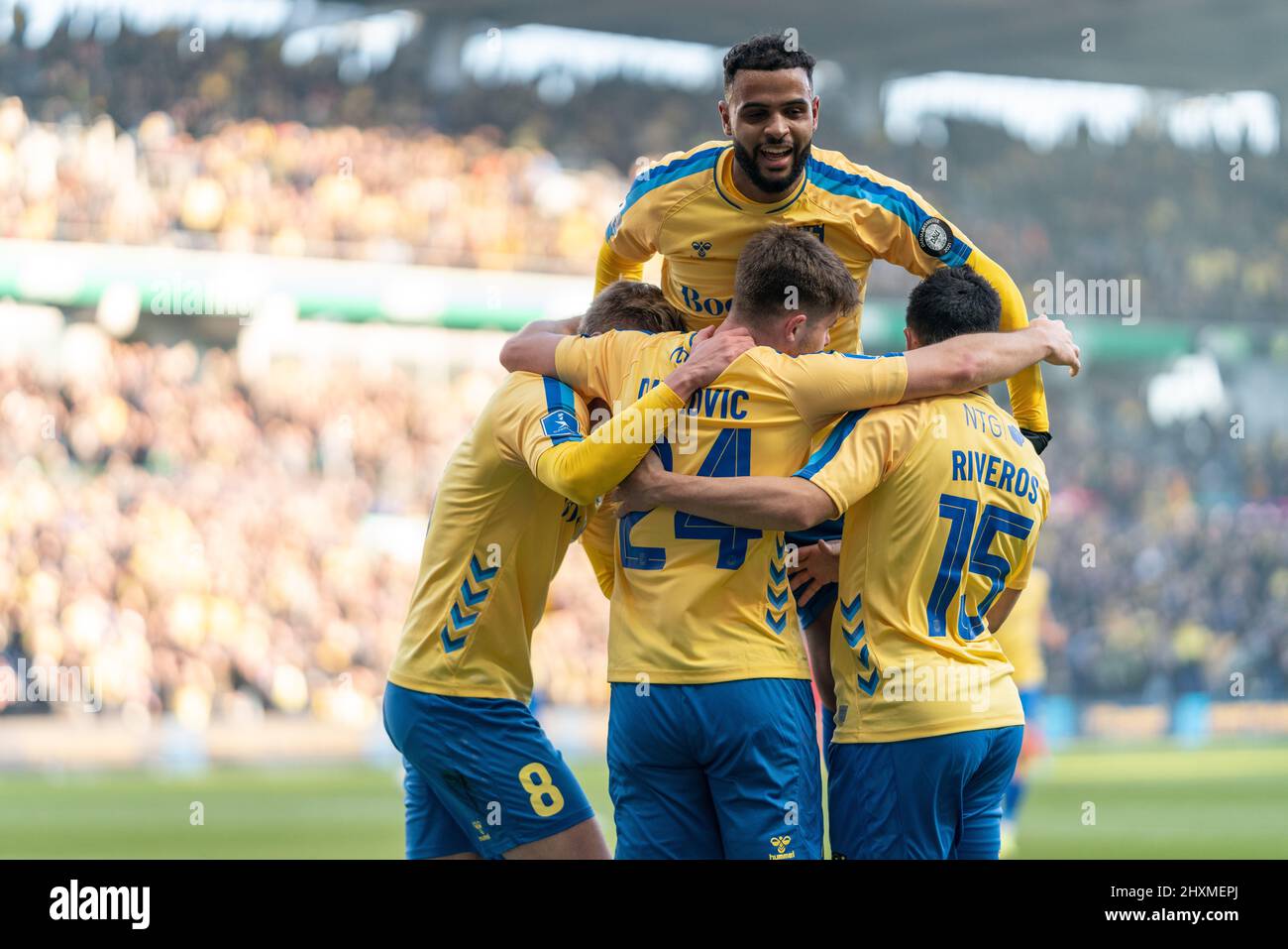 Brondby, Denmark. 13th Mar, 2022. Marko Divkovic (24) of Broendby IF scores for 1-0 and celebrates with the team mates during the 3F Superliga match between Broendby IF and Aarhus GF at Brondby Stadium. (Photo Credit: Gonzales Photo/Alamy Live News Stock Photo