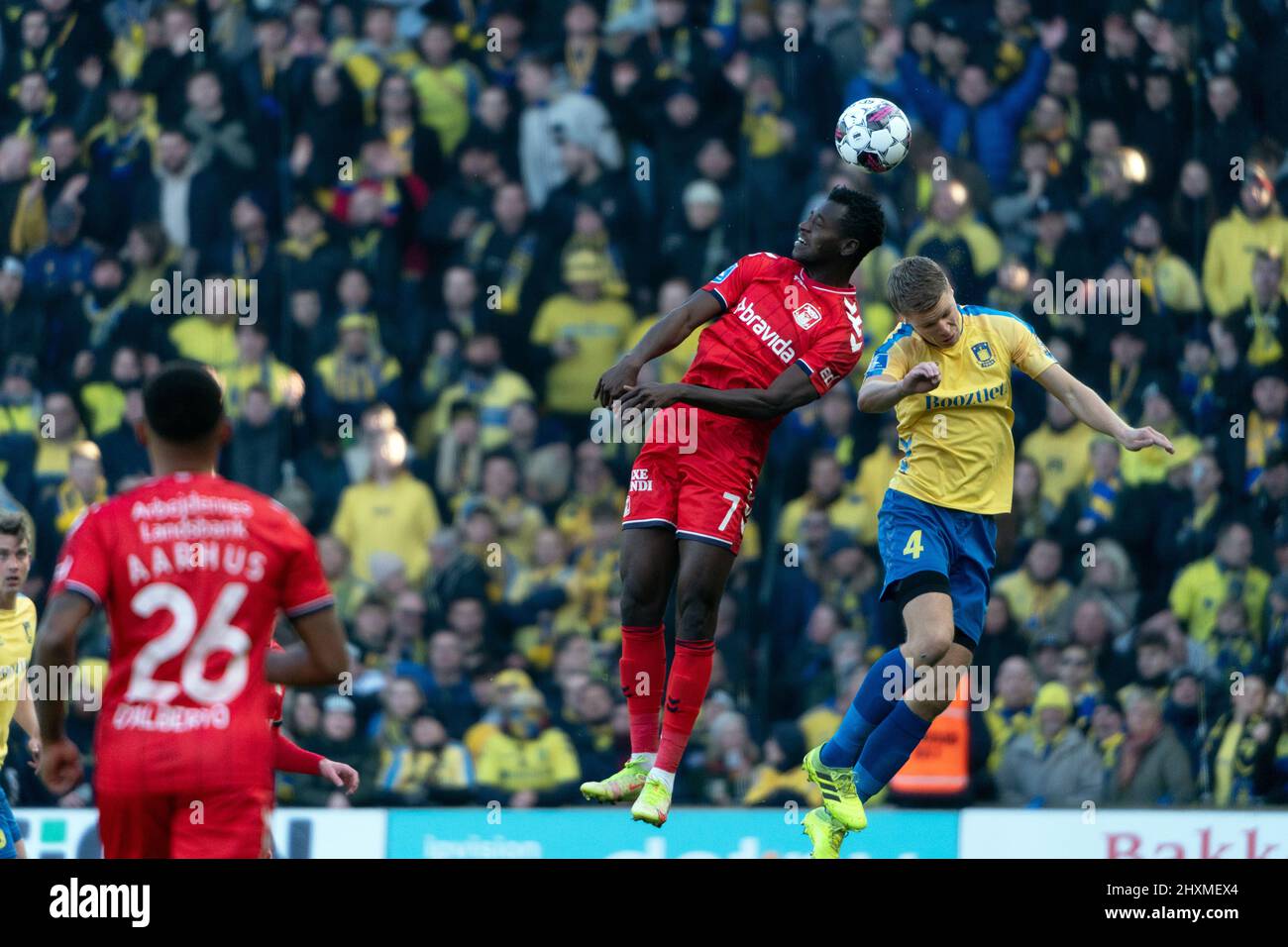 Brondby, Denmark. 13th Mar, 2022. Mustapha Bundu (7) of Aarhus GF and Sigurd Rosted (4) of Broendby IF seen during the 3F Superliga match between Broendby IF and of Aarhus GF at Brondby Stadium. (Photo Credit: Gonzales Photo/Alamy Live News Stock Photo