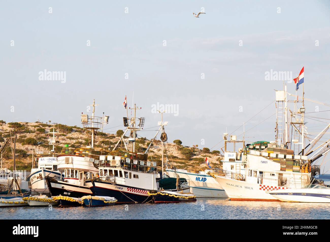 Tribunj, Croatia- August 23, 2021: Fishing ships in harbour Stock Photo