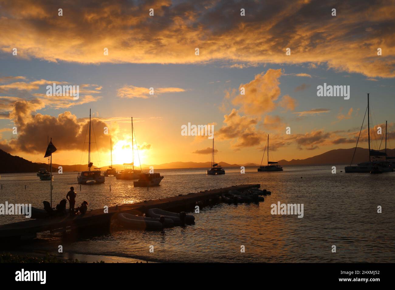 Sunset views of yachts from Cooper Island Resort on British Virgin Islands Stock Photo