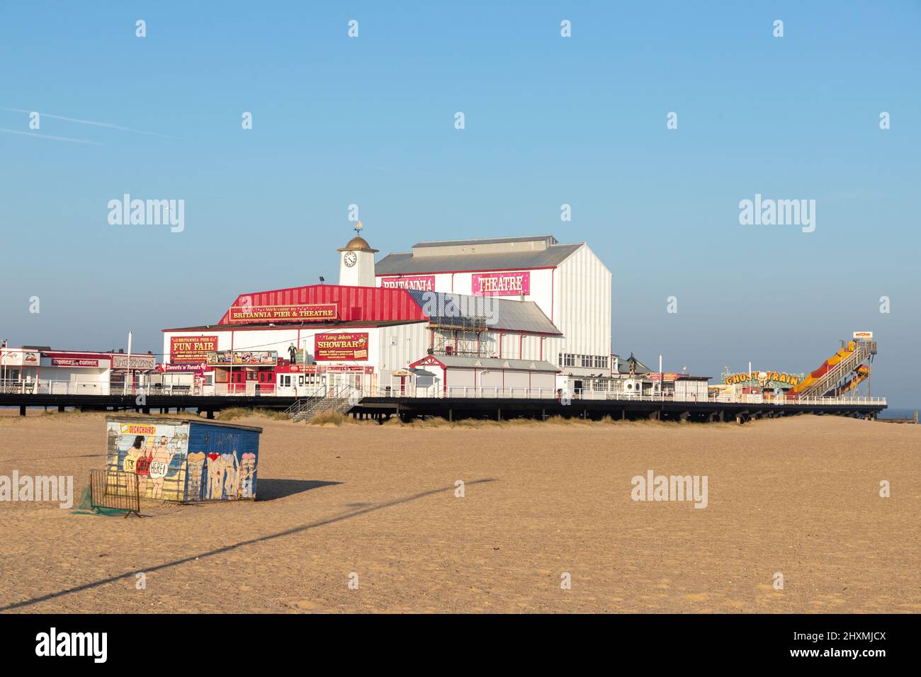 A distance picture of Britannia Pier in Great Yarmouth, North Norfolk, UK showing the roller coaster at the end of the pier Stock Photo