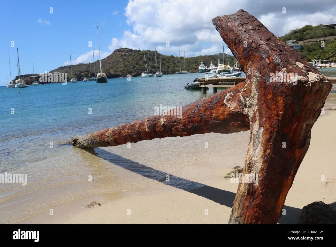 Enormous rusting anchor on Galleon beach near English Harbour in Antigua and Barbuda Stock Photo
