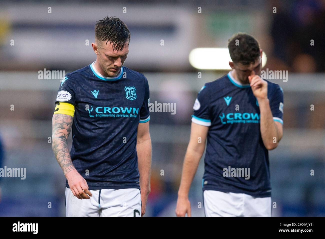 13th March 2022 ; Dens Park, Dundee, Scotland: Scottish Cup football, Dundee versus Rangers; Jordan McGhee and Shaun Byrne look dismayed at the end of the match Stock Photo