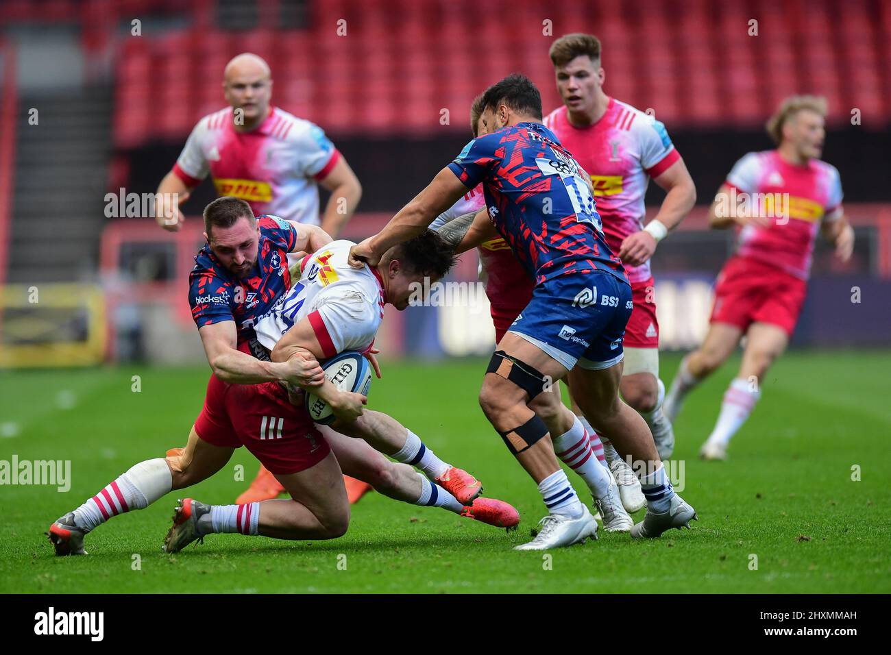 Rich Lane of Rugby Bristol Bears, tackles Cadan Murley of Harlequins