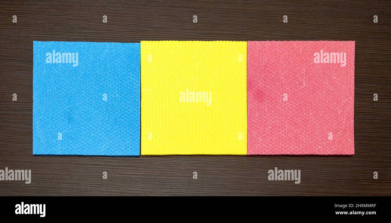 Different colors kitchen sponge cloth pattern texture background Stock Photo