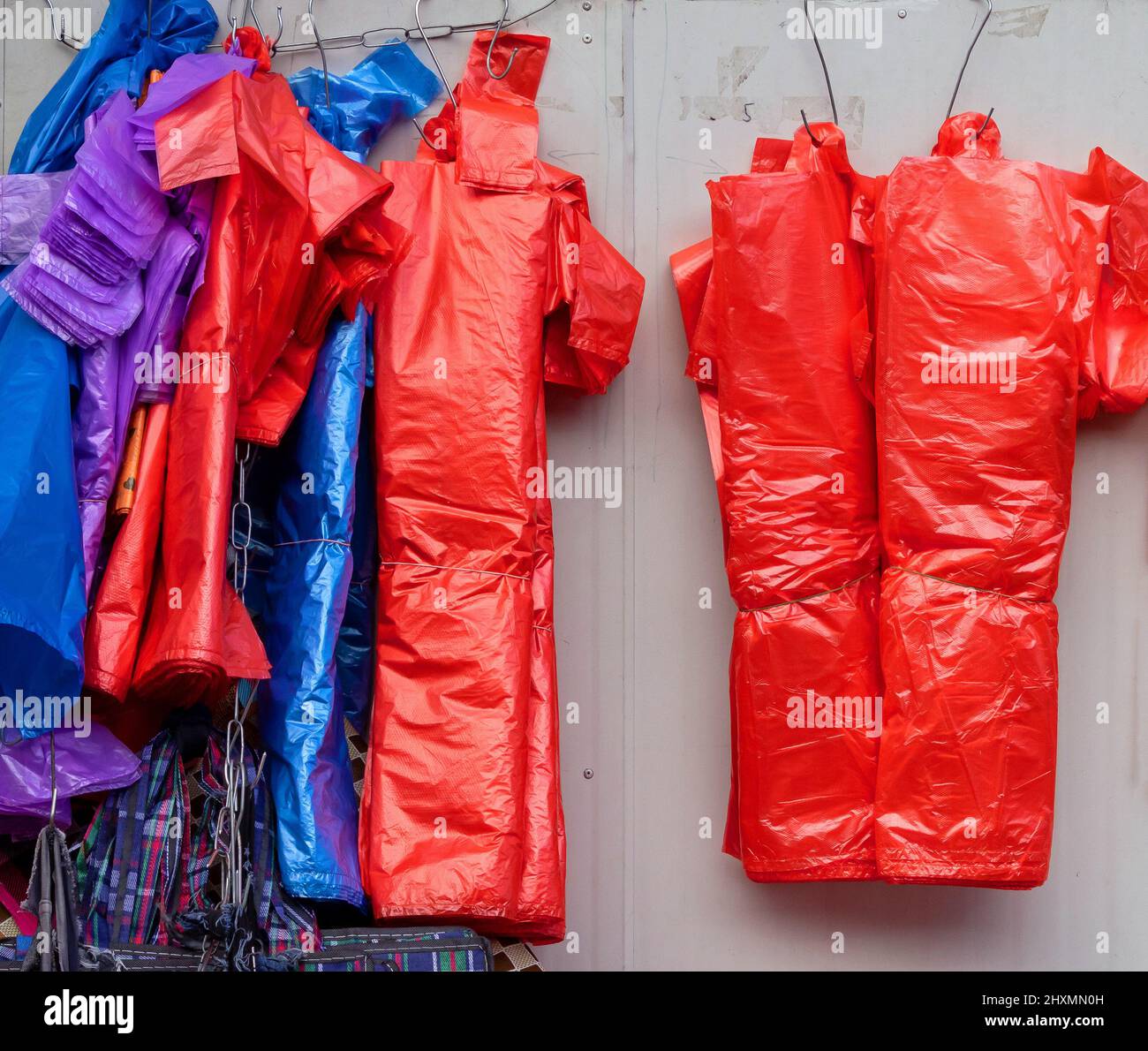 Colorful plastic bags used in green market to pick up products people