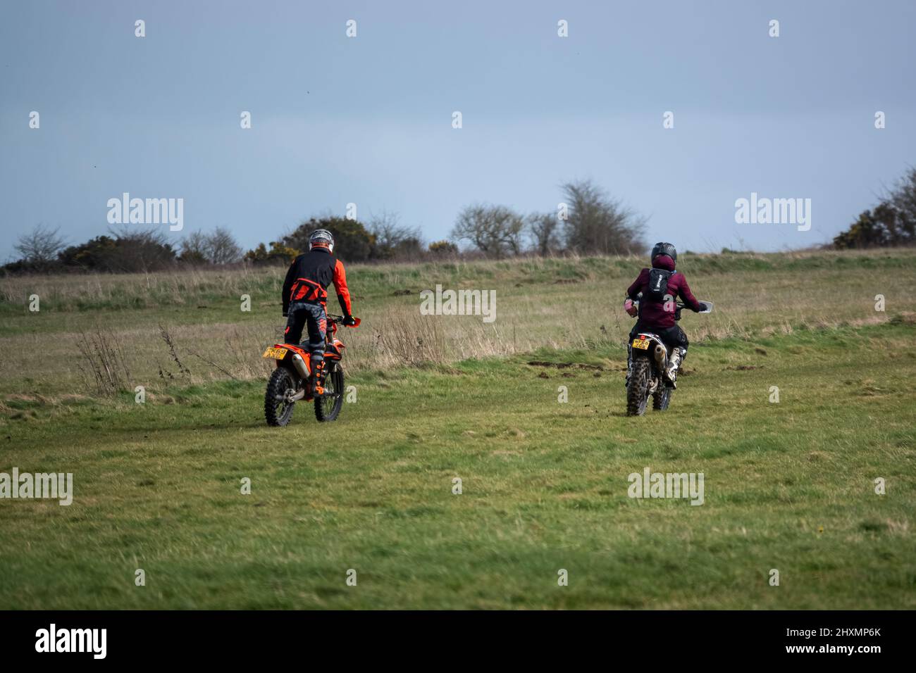 Road Motor Riding Image a pair of motor cyclists (bikers) riding off-road motorbikes across ...