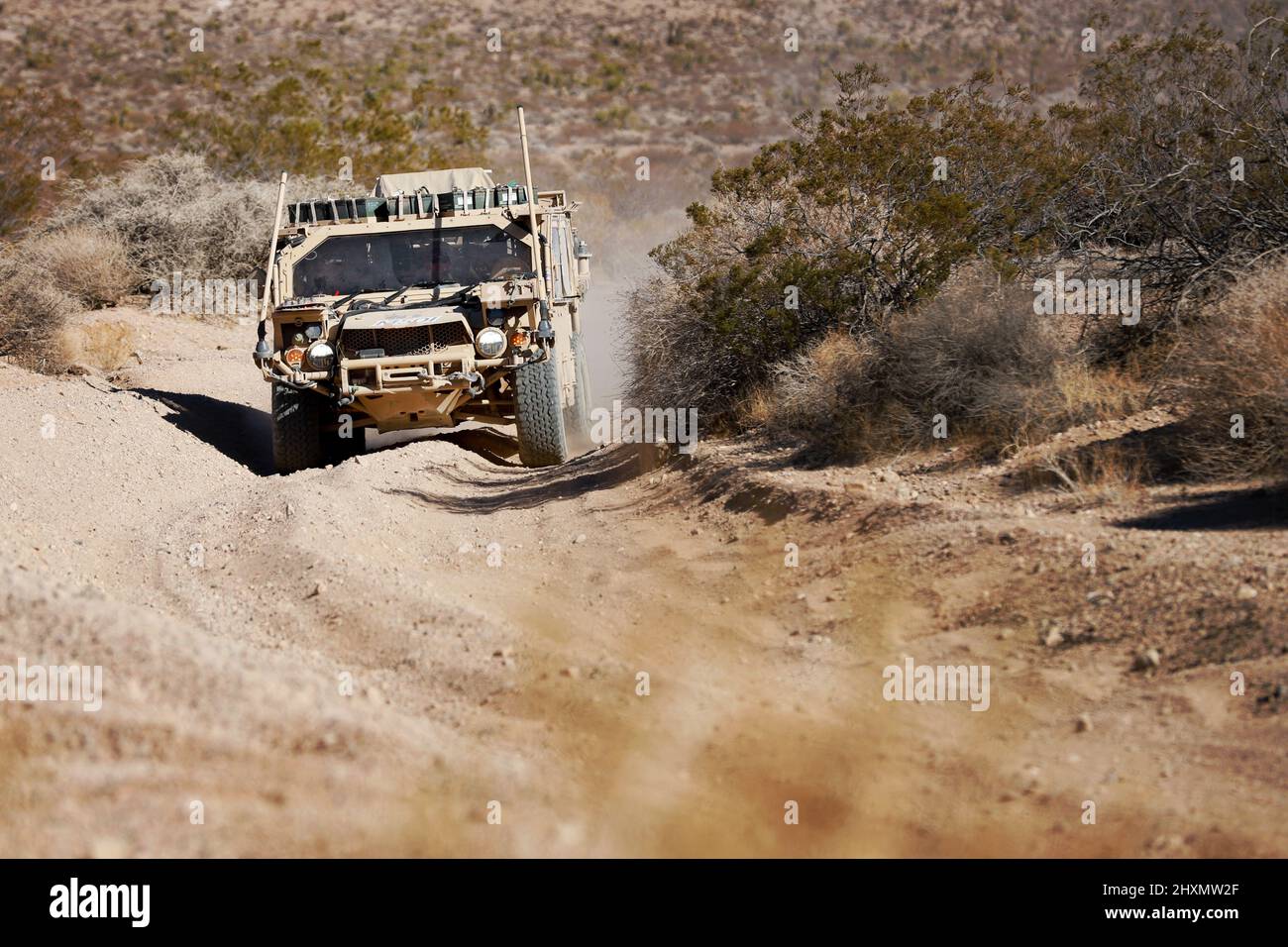 Green Berets with the 5th Special Forces Group (Airborne), maneuver a