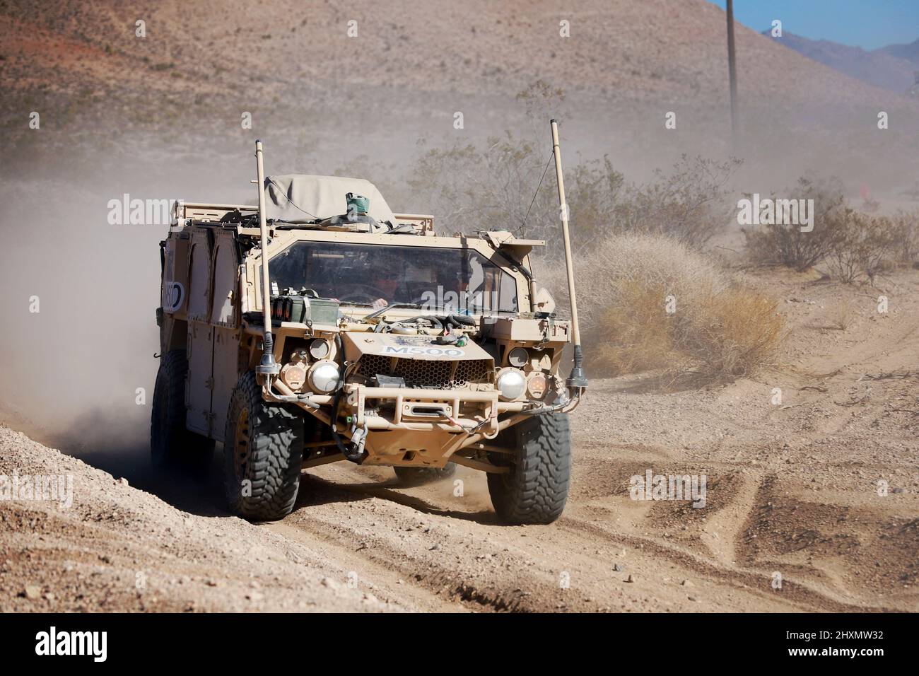 Green Berets with the 5th Special Forces Group (Airborne), maneuver a