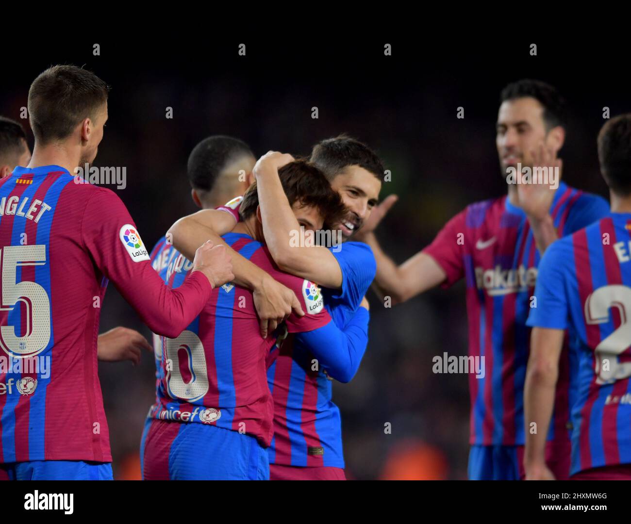 Barcelona,Spain.13 March,2022.  Riqui Puig (6) of FC Barcelona celebrates scoring the fourth goal with teammates during the spanish La Liga match between FC Barcelona and Osasuna at Camp Nou Stadium. Stock Photo