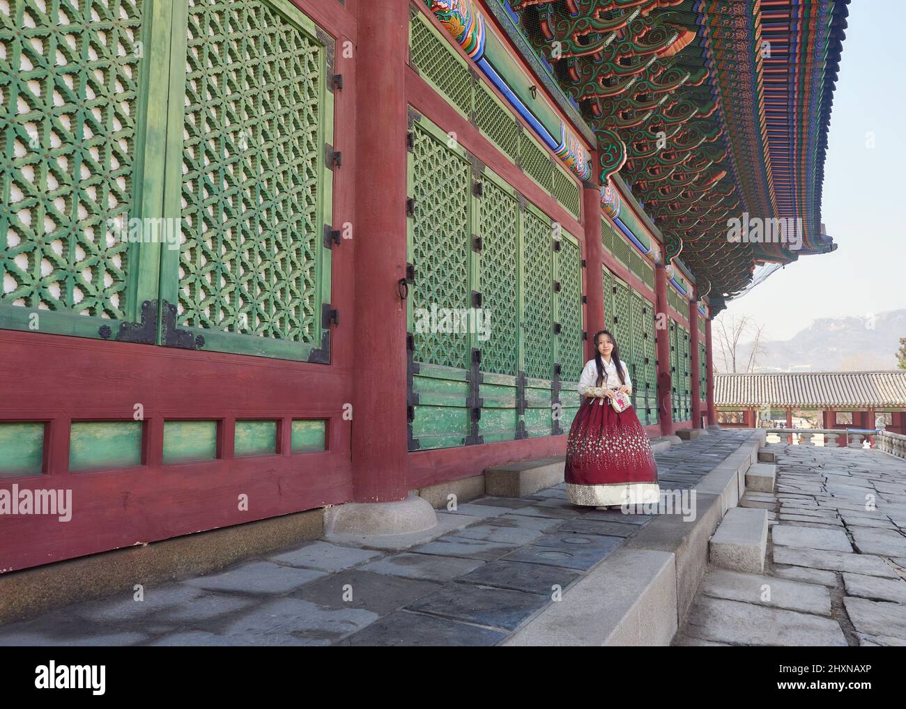 Girls in Korean traditional dress, Hanbok in Kyungbok Palace, Seoul, South Korea Stock Photo
