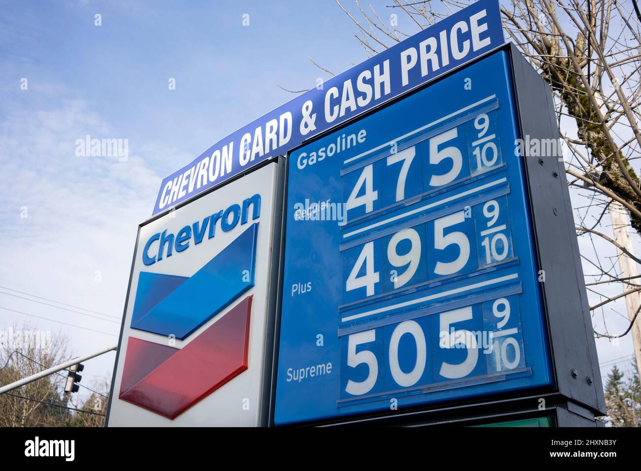 The gas price sign at a Chevron gas station in West Linn, Oregon, seen on March 11, 2022. Oil and gas prices are soaring due to Russia's war in Ukraine. Stock Photo