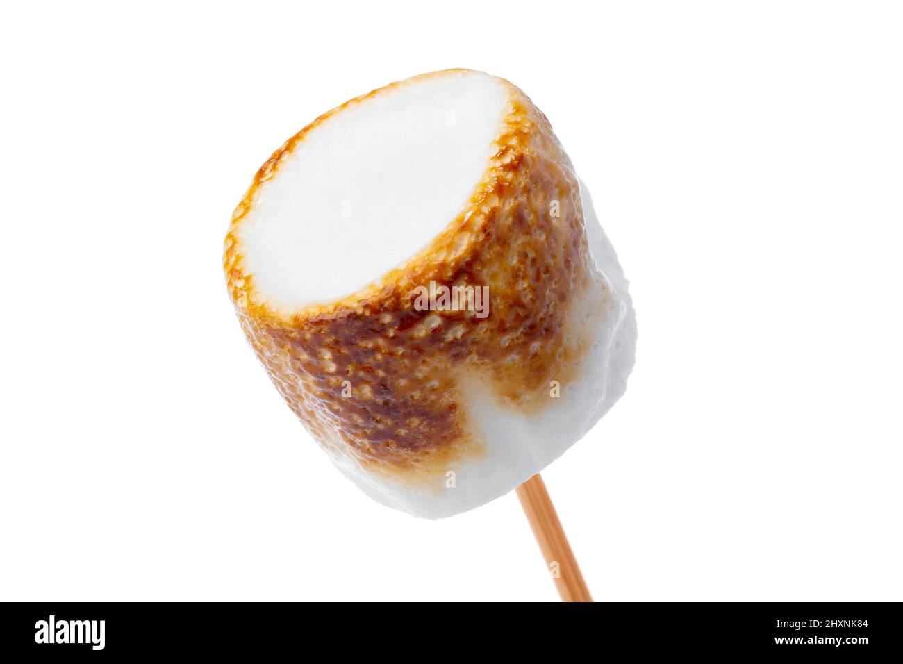 Grilled marshmallows on sticks isolated on white Stock Photo