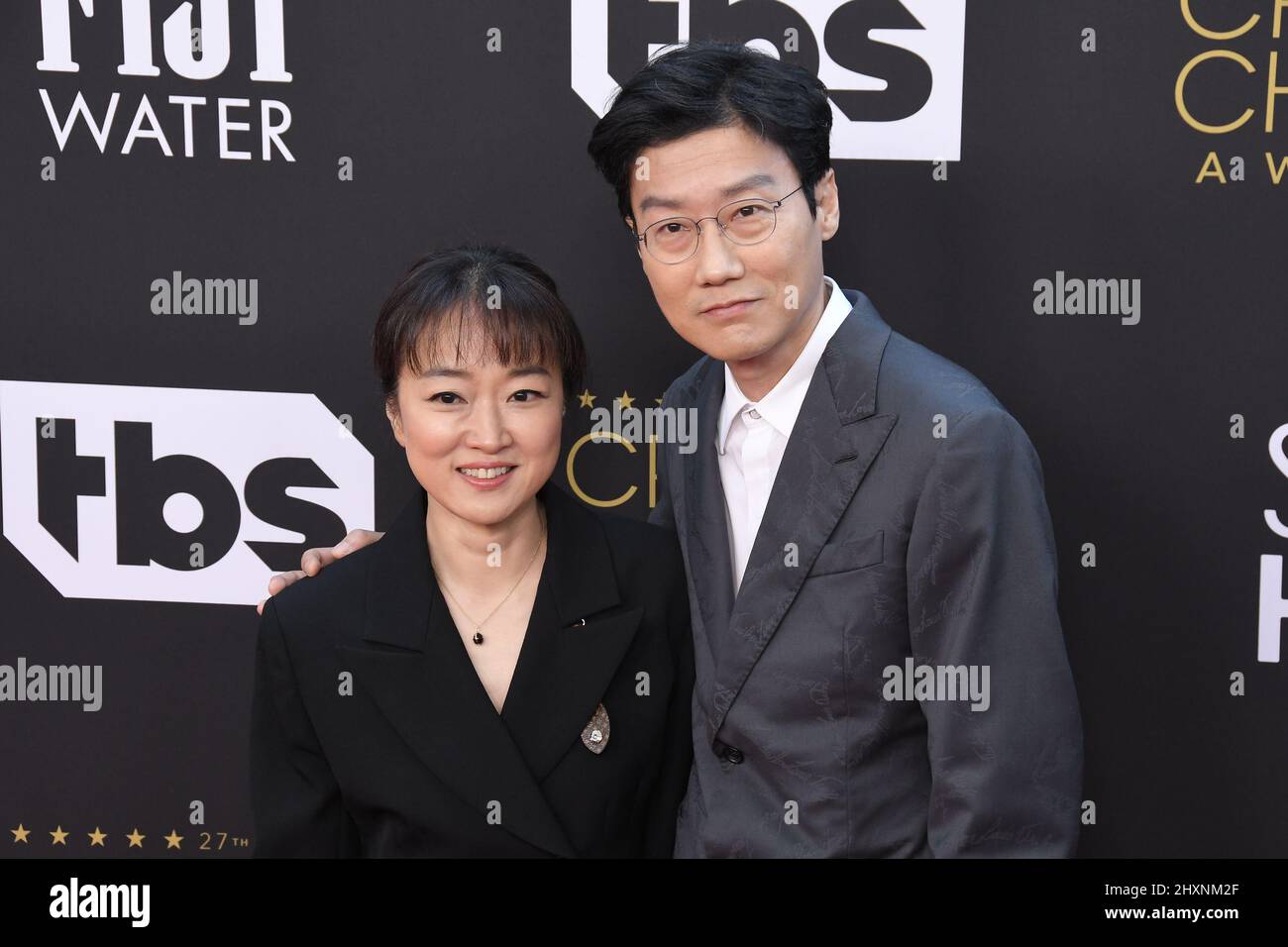 Los Angeles, USA. 13th Mar, 2022. Kim Ji-yeon and Hwang Dong-hyuk arrive at the 27th Annual Critics Choice Awards held at The Fairmont Century Plaza in Los Angeles, CA on Sunday, ?March 13, 2022. (Photo By Sthanlee B. Mirador/Sipa USA) Credit: Sipa USA/Alamy Live News Stock Photo
