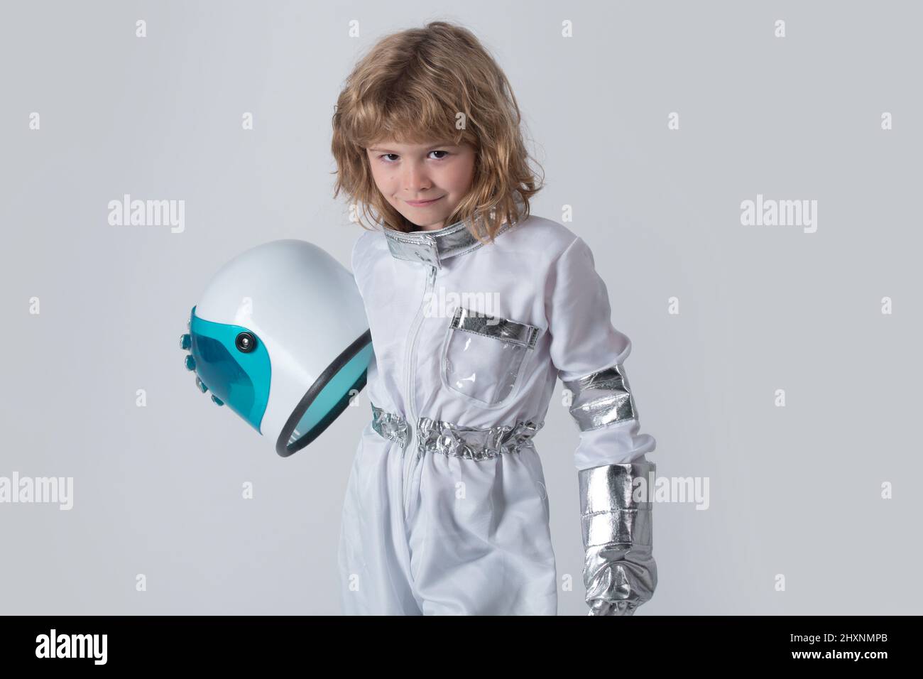 Kid boy exploring space. Portrait of cute kids in space suits ...