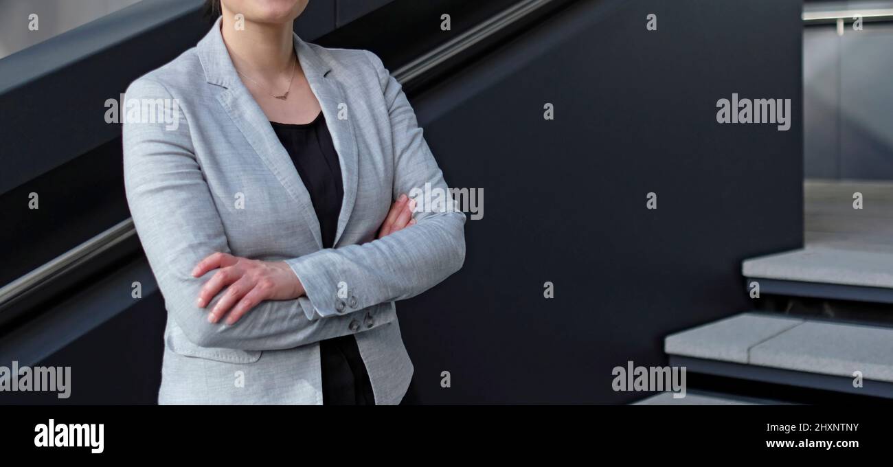 Professional woman in black suit hi-res stock photography and images ...