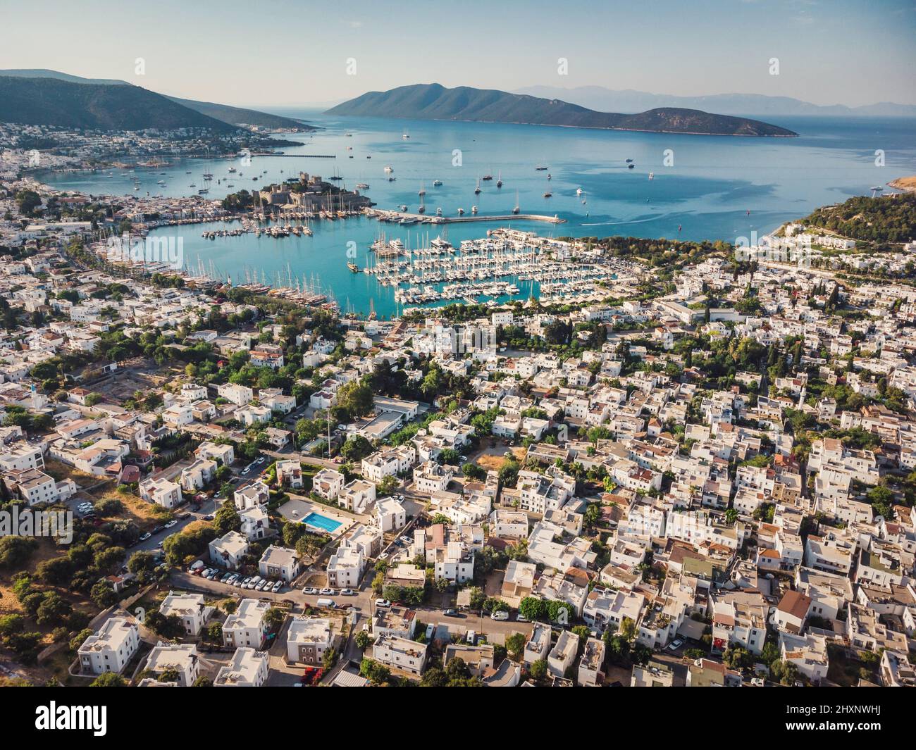 Beautiful Mediterranean seascape. Beautiful European town in greece style on summer sea coast. panorama landscape view sky, mountains, water, city Stock Photo