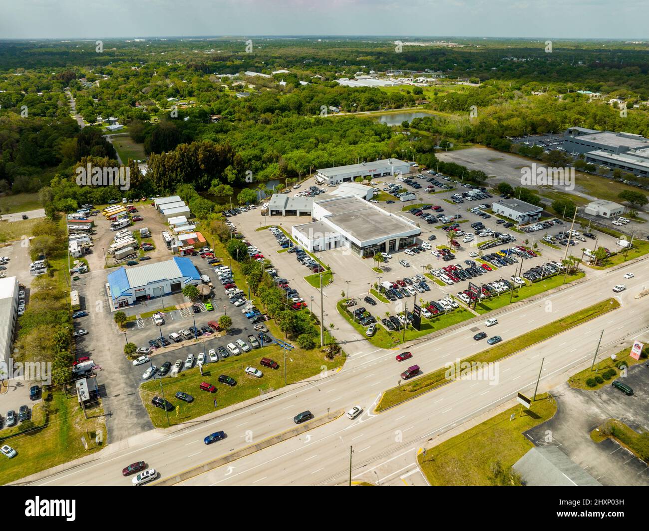 Fort Pierce, FL, USA March 9, 2022 Aerial photo of car dealerships