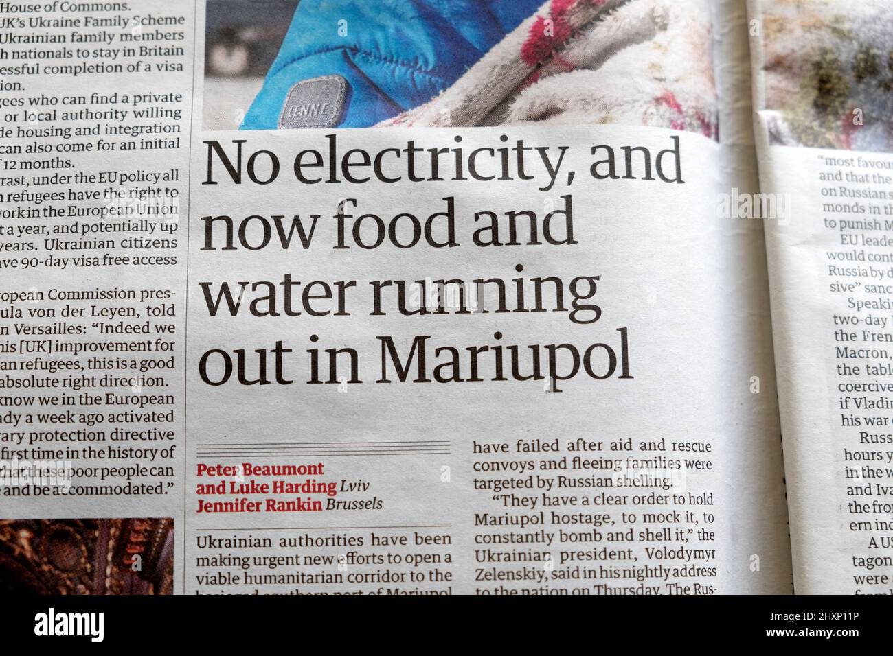 'No electricity, and now food and water running out in Mariupol' Guardian newspaper headline article clipping on 11 March 2022 London England UK Great Stock Photo