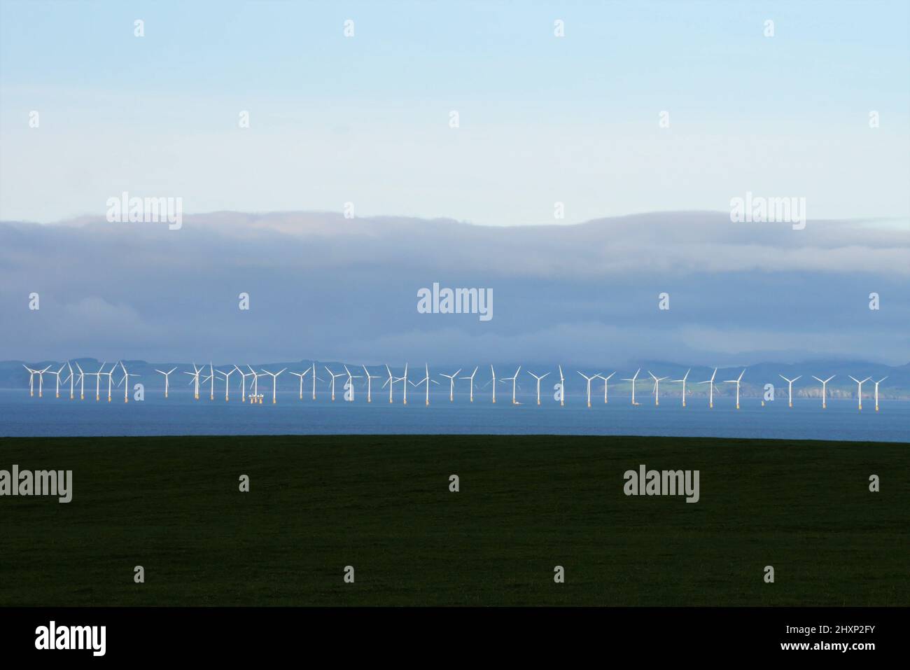Robin Rigg Off-shore Wind Farm, Solway Firth, from Flimby, Cumbria England, United Kingdom Stock Photo