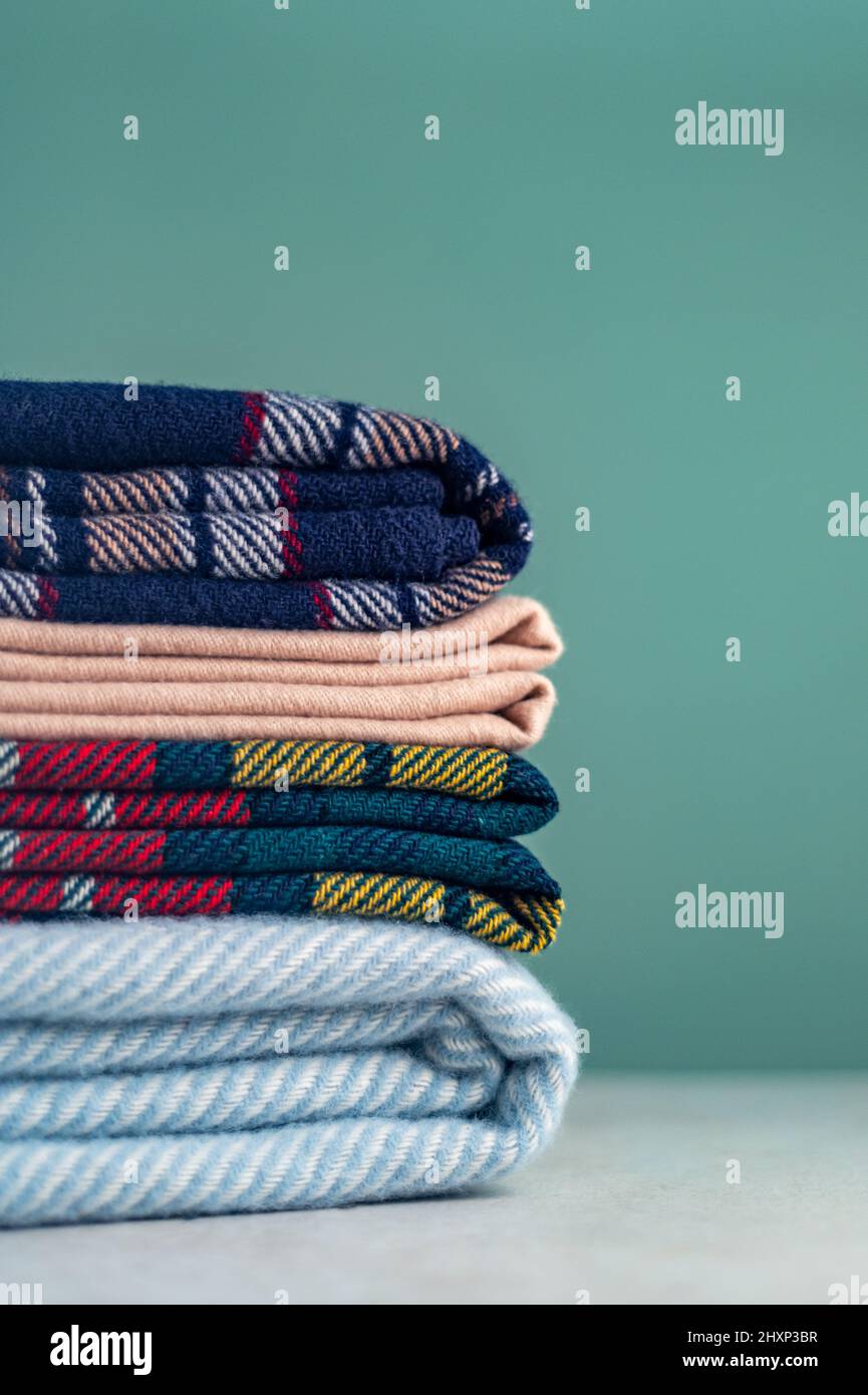Stack of woolen checked blankets Stock Photo