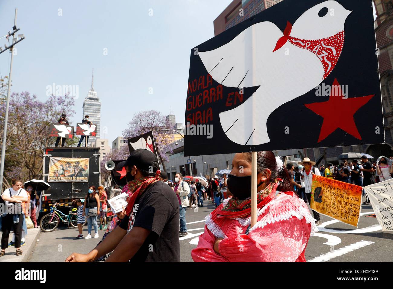 Non Exclusive: MEXICO CITY, MEXICO - MARCH 13, 2022: Supporters of the Zapatista Army of National Liberation and indigenous communities (EZLN) take pa Stock Photo