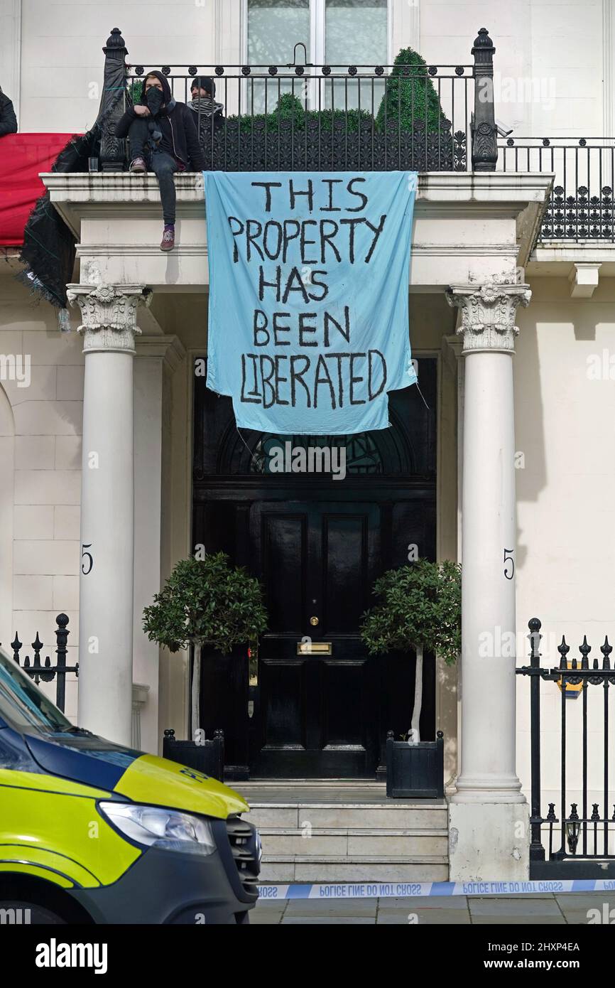 London, UK, 19th March 2022. Demonstrators gathered outside a mansion in  Holland Park owned by Russian oligarch Vladimir Yevtushenkov (aka  Evtushenkov), owner of Kronshtadt, part of Sistema Group, which the  protesters say