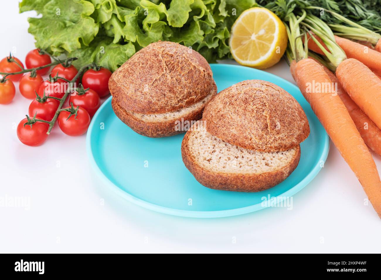 Healthy Vegan Burger. Hamburgers and fresh vegetables on a white