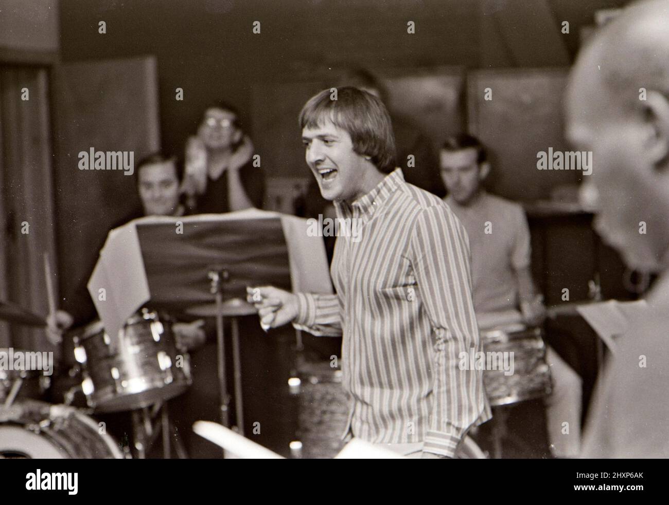 SONNY AND CHER Sonny Bono in a London recording studio in August 1966/ His  partner Cher can be seen in some images with a tambourine Stock Photo -  Alamy