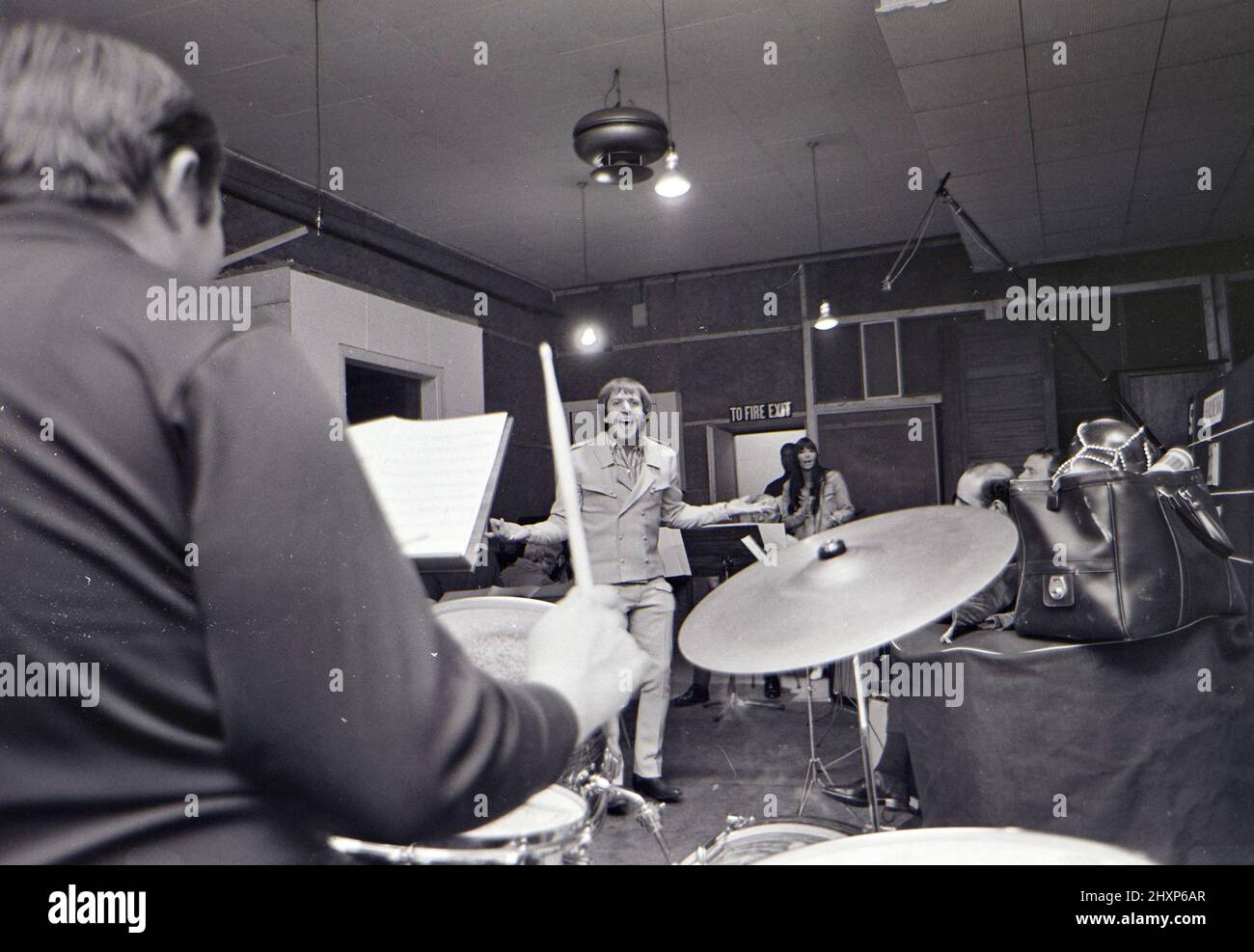 SONNY AND CHER Sonny Bono in a London recording studio in August 1966/ His  partner Cher can be seen in some images with a tambourine Stock Photo -  Alamy