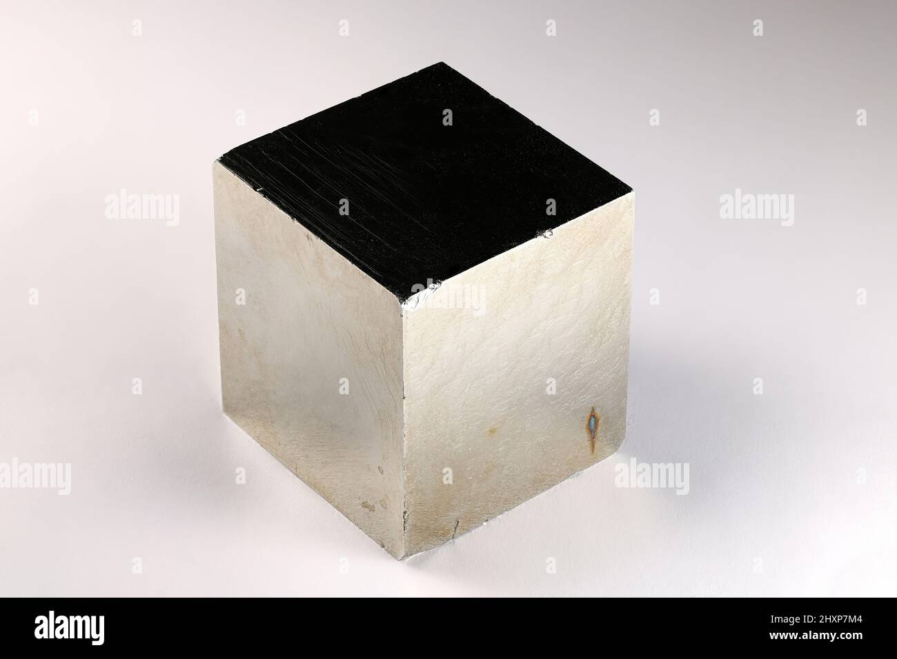 Cubic crystal of pyrite. Pyrite is an iron sulfide and the most abundant sulfide mineral. Stock Photo