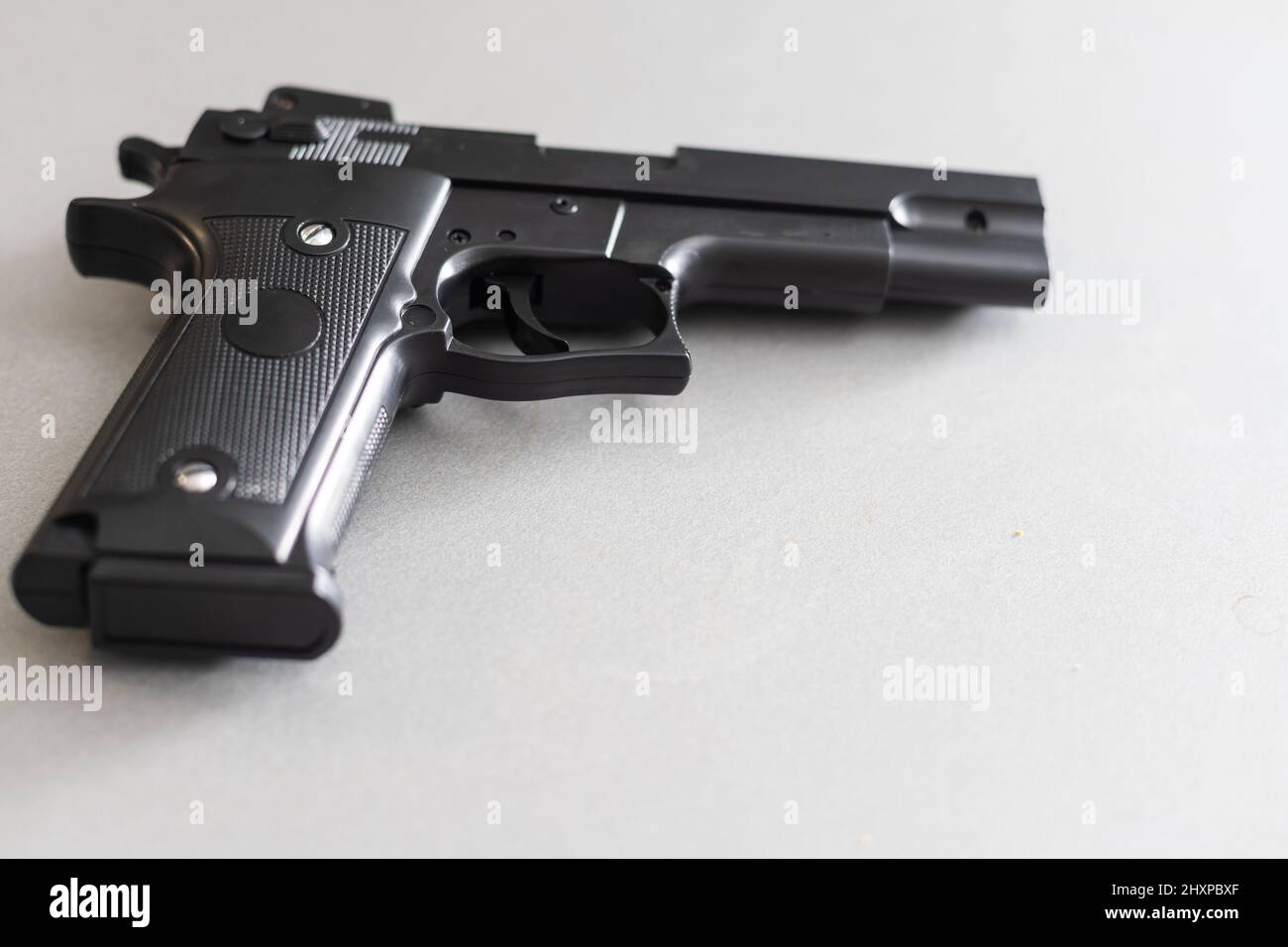 Pistol isolated on white background Stock Photo - Alamy