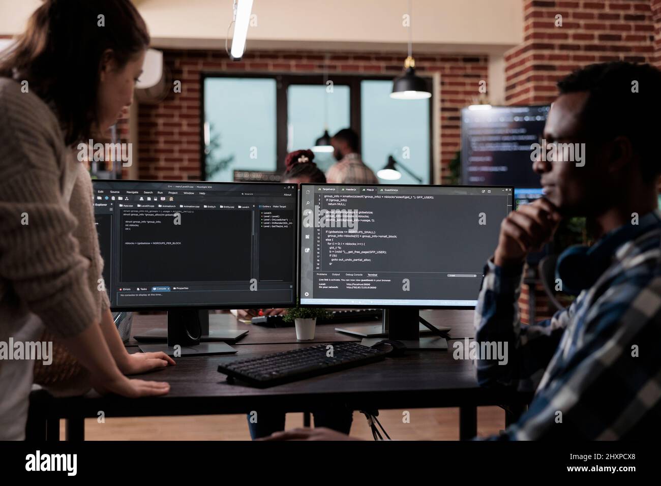 Multiethnic cyber security team members in agency office writing cloud ...