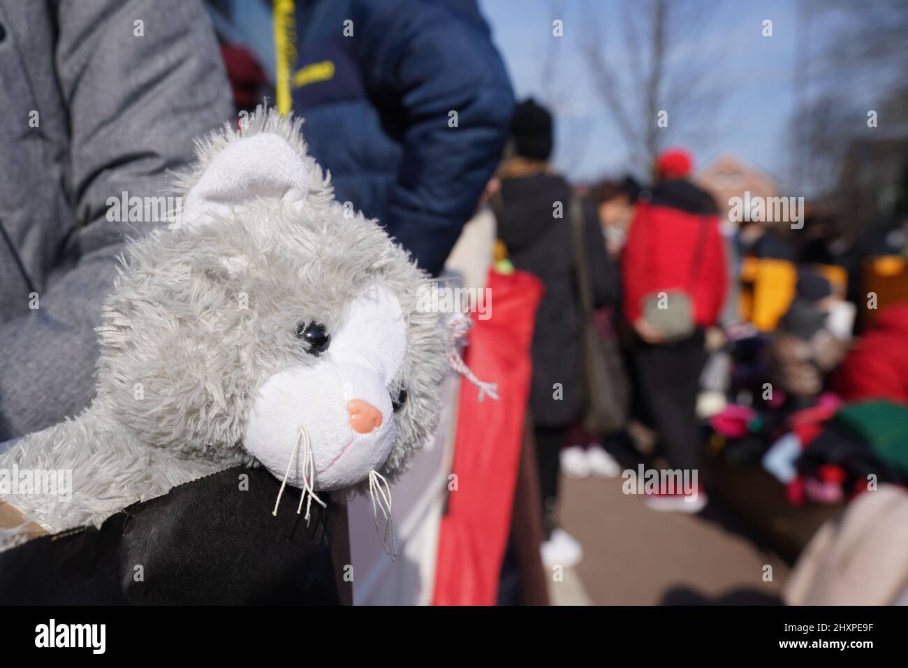 Hamburg, Germany. 14th Mar, 2022. Ukrainian refugees wait for admission in front of the registration office for refugees of the Office for Migration in Hammer Straße. Credit: Marcus Brandt/dpa/Alamy Live News Stock Photo