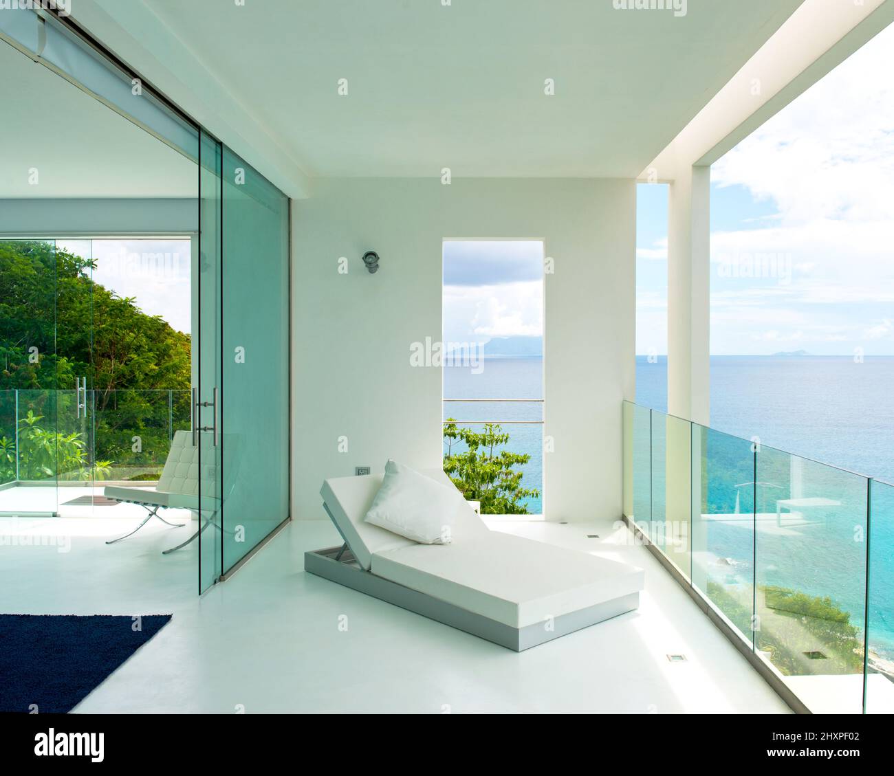 cubistic minimalistic beach house on Mahe Island, Seychelles Stock Photo