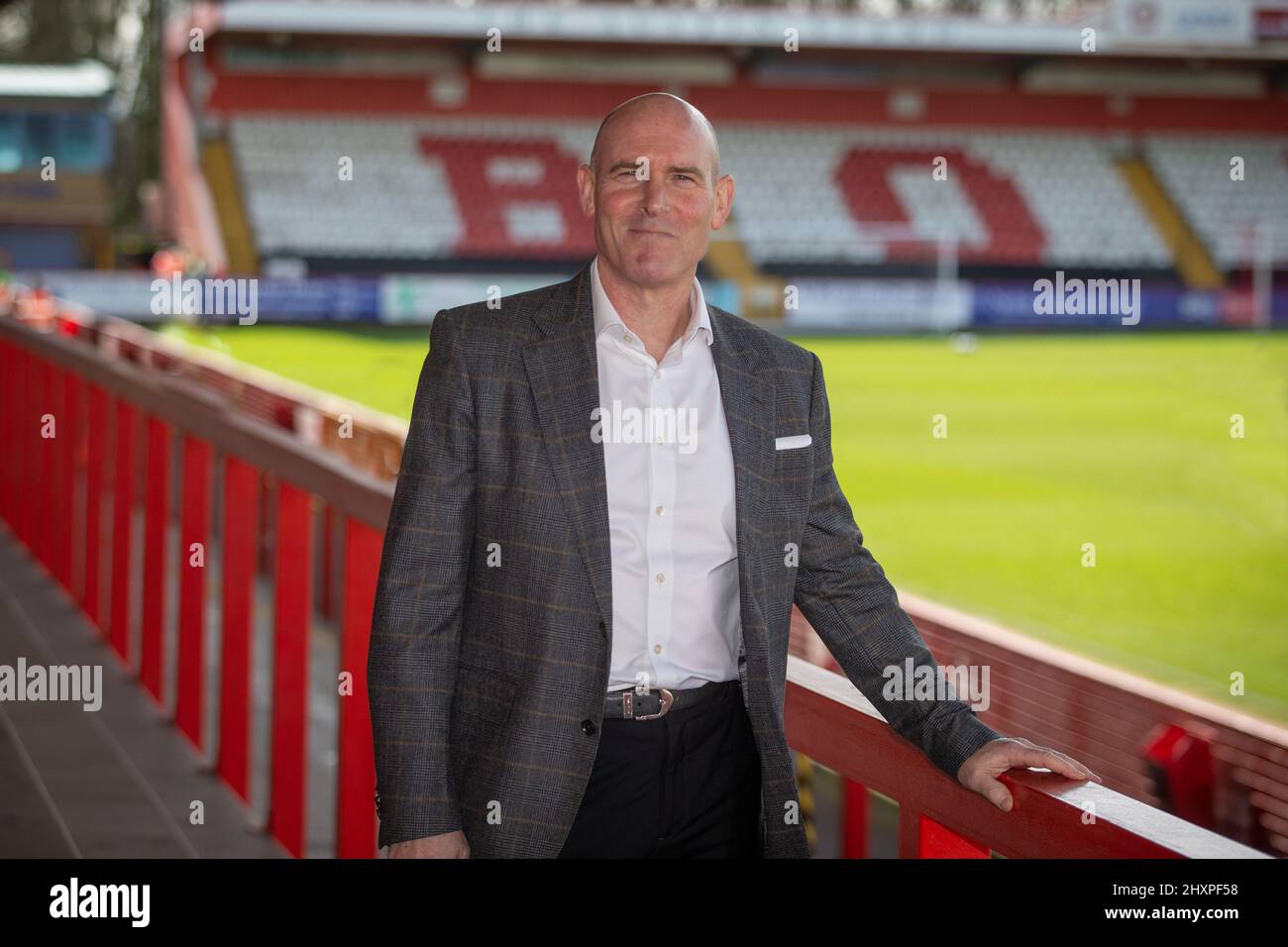 Dominic Jordan standing in Lamex Stadium, Stevenage when he was CEO at Stevenage FC Stock Photo