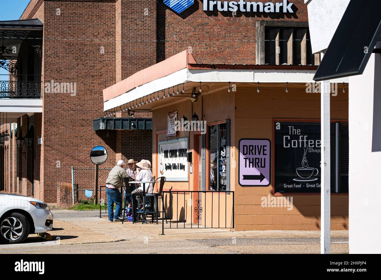 Selma, Alabama, USAMarch 1, 2022 Three people enjoy a meal and