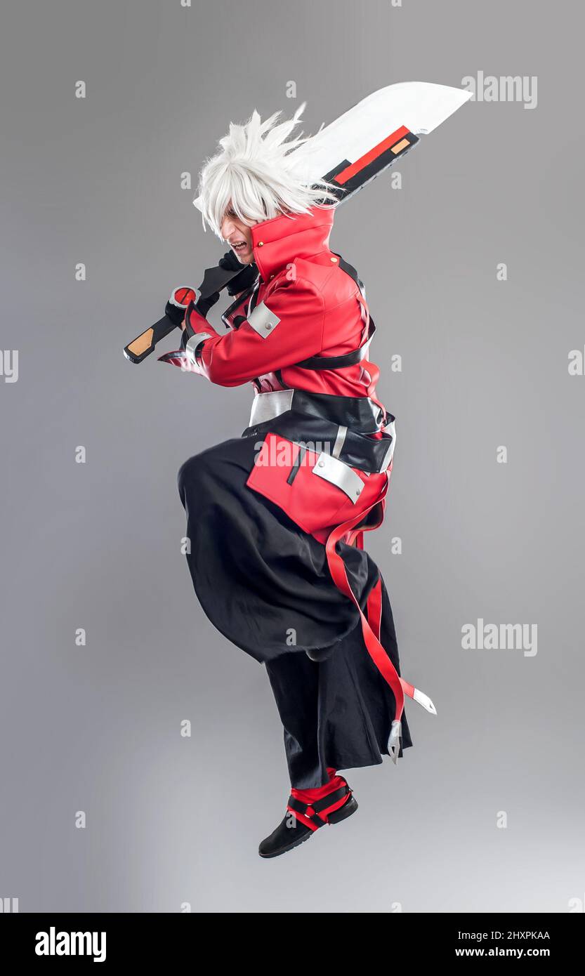 Manga hero with sword. Young man dressed in comic style superhero Stock  Photo - Alamy