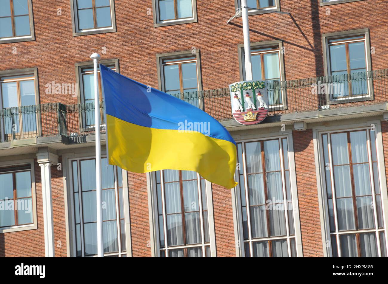 Frederiksberg/Copenhagen/Denmark.14.March 2022/Ukrainian lag along with danish flag fly in yard of Frederiksberg town hall to pay respect to Ukrainian people thier war against Russia and urkianian nation..    (Photo..Francis Dean/Dean Pictures) Stock Photo