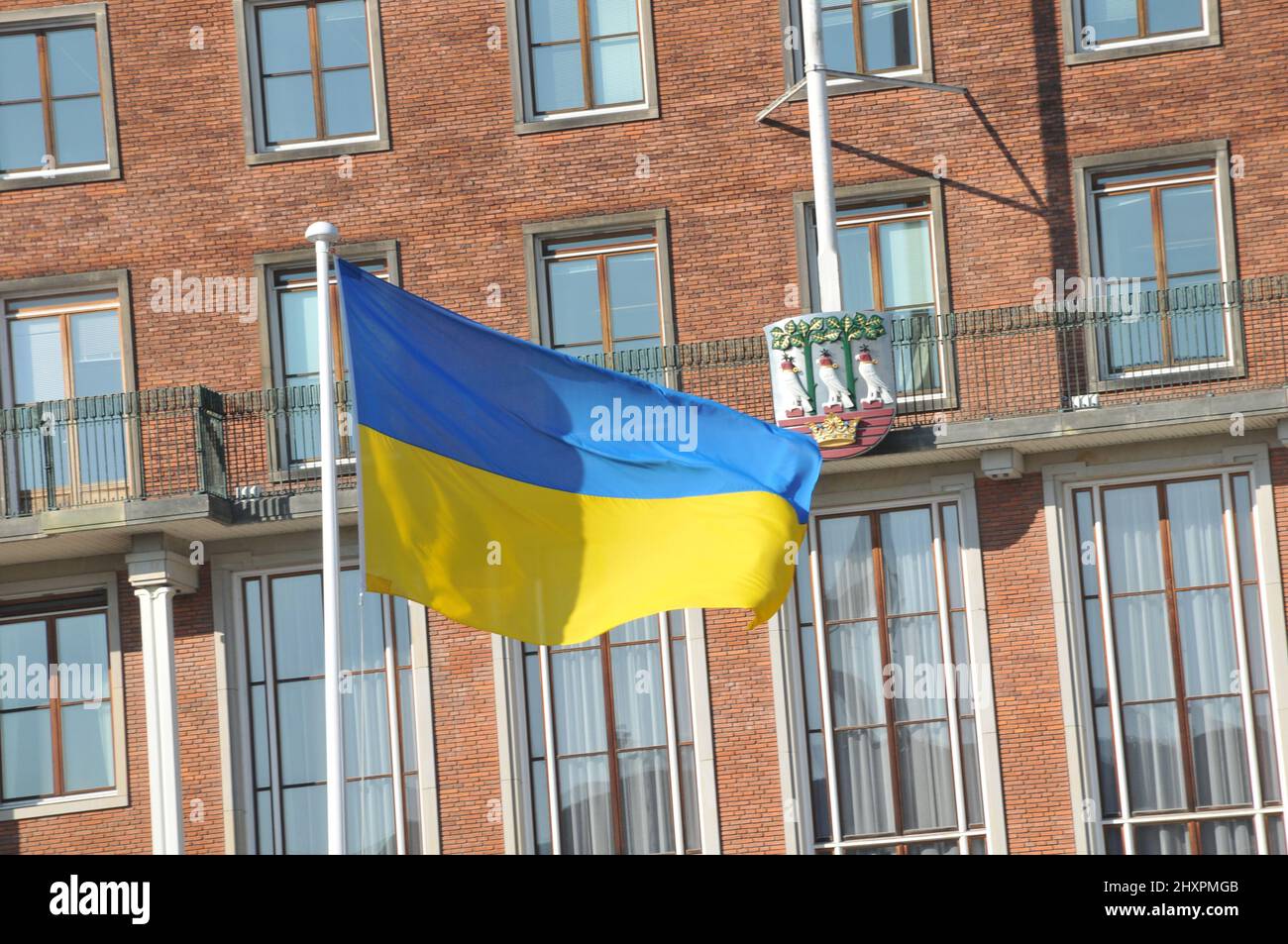 Frederiksberg/Copenhagen/Denmark.14.March 2022/Ukrainian lag along with danish flag fly in yard of Frederiksberg town hall to pay respect to Ukrainian people thier war against Russia and urkianian nation..    (Photo..Francis Dean/Dean Pictures) Stock Photo