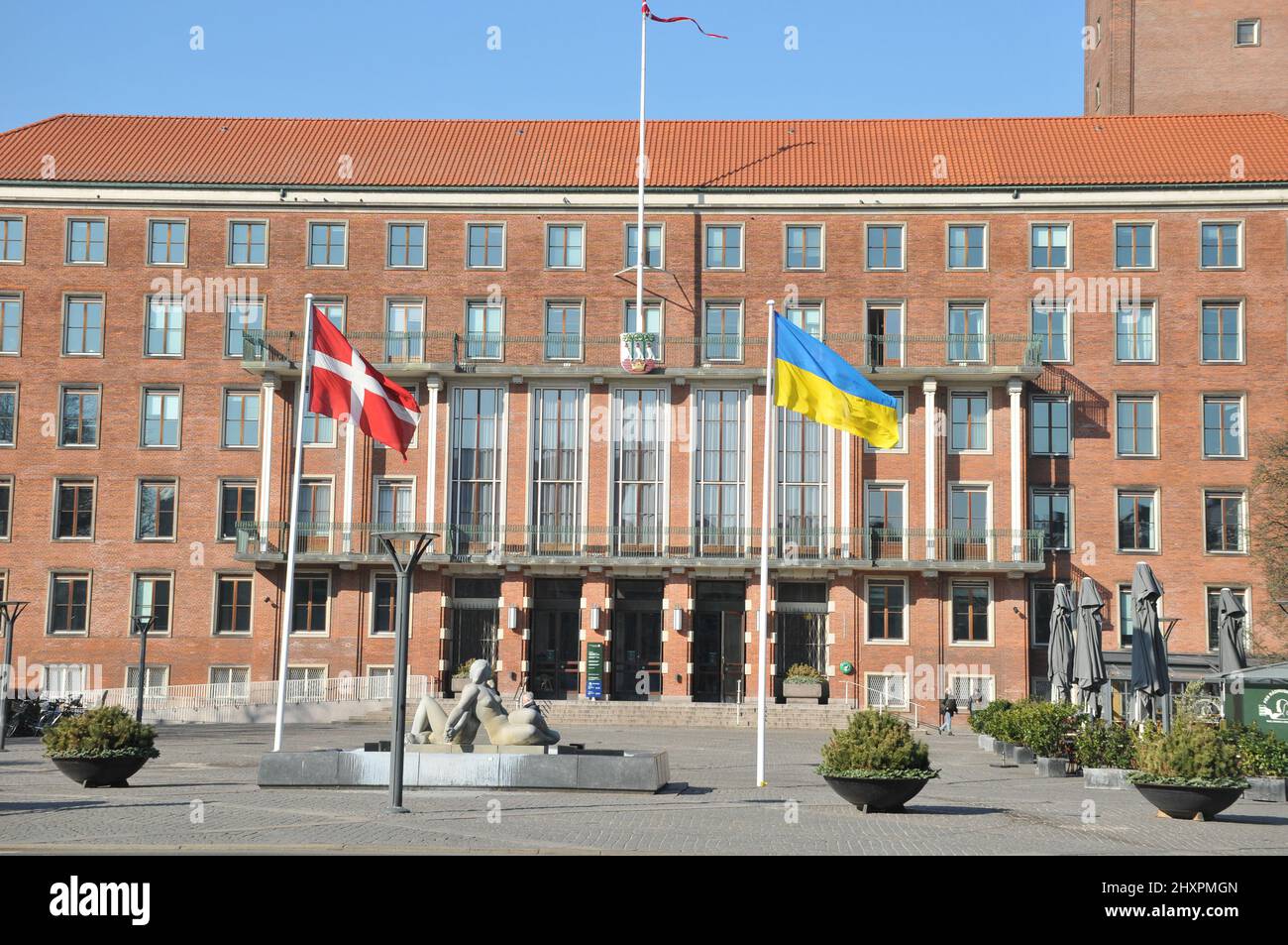 Frederiksberg/Copenhagen/Denmark.14.March 2022/Ukrainian lag along with danish flag fly in yard of Frederiksberg town hall to pay respect to Ukrainian people thier war against Russia and urkianian nation..    (Photo..Francis Dean/Dean Pictures) Stock Photo