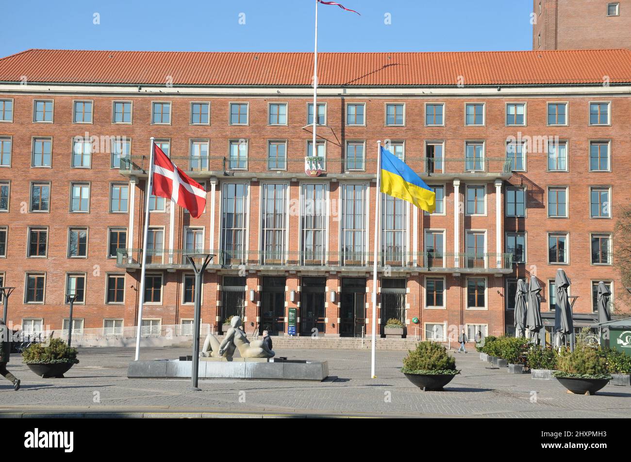 Frederiksberg/Copenhagen/Denmark.14.March 2022/Ukrainian lag along with danish flag fly in yard of Frederiksberg town hall to pay respect to Ukrainian people thier war against Russia and urkianian nation..    (Photo..Francis Dean/Dean Pictures) Stock Photo