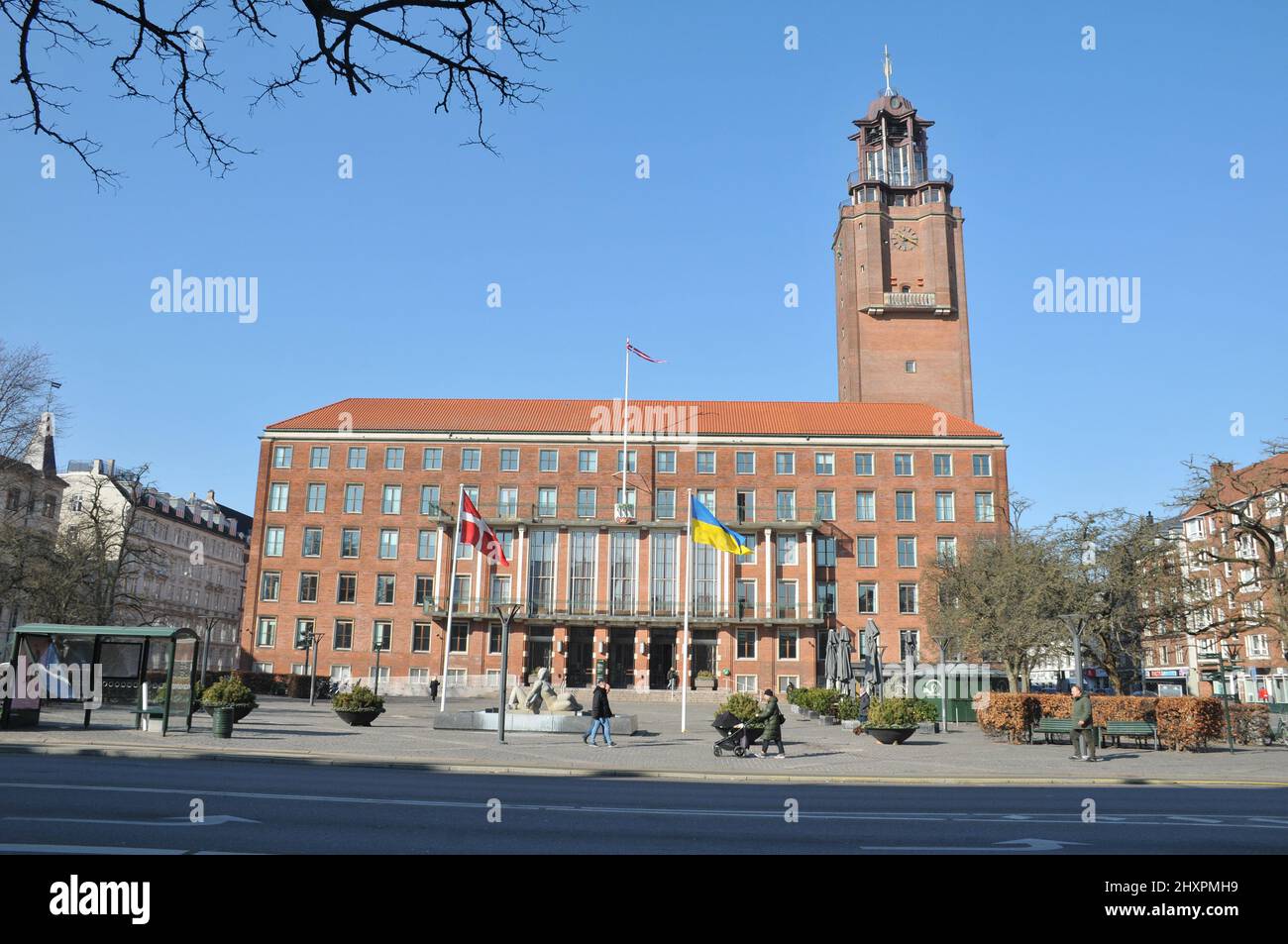 Frederiksberg/Copenhagen/Denmark.14.March 2022/Ukrainian lag along with danish flag fly in yard of Frederiksberg town hall to pay respect to Ukrainian people thier war against Russia and urkianian nation..    (Photo..Francis Dean/Dean Pictures) Stock Photo